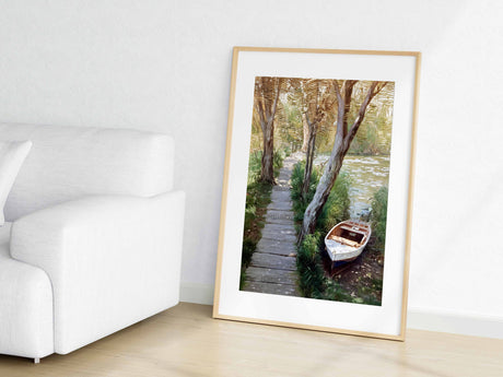 A detailed view of the landscape painting with a boat docked in a forested area by the river - MRC Art by Design