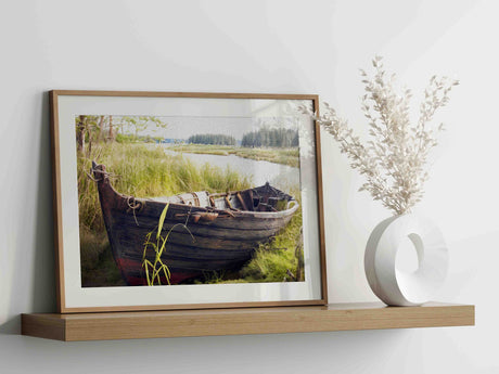 Row boat at the river surrounded by natural forest